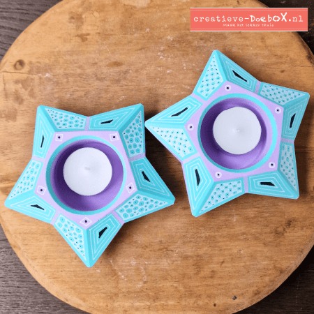 Ster waxinelichtjes (2 stuks) van keramisch gips om zelf te beschilderen. Grote sterren van 14 cm met moderne uitstraling, wax inbegrepen