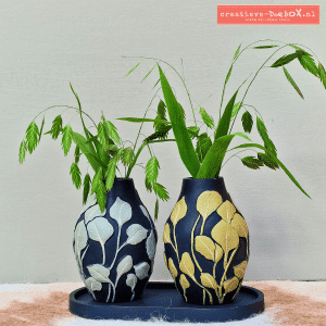 Hoe kun je botanische vaasjes stylen met grasjes of droogbloemen?